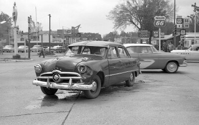 1957 Carthage - wreck in front of Boots