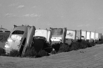01f/05/huty/14972/13 January 1981: A memorial to cadillacs created by Texan businessman Stanley Marsh. Every time he buys a new Cadillac he part-buries his old one in concrete on...